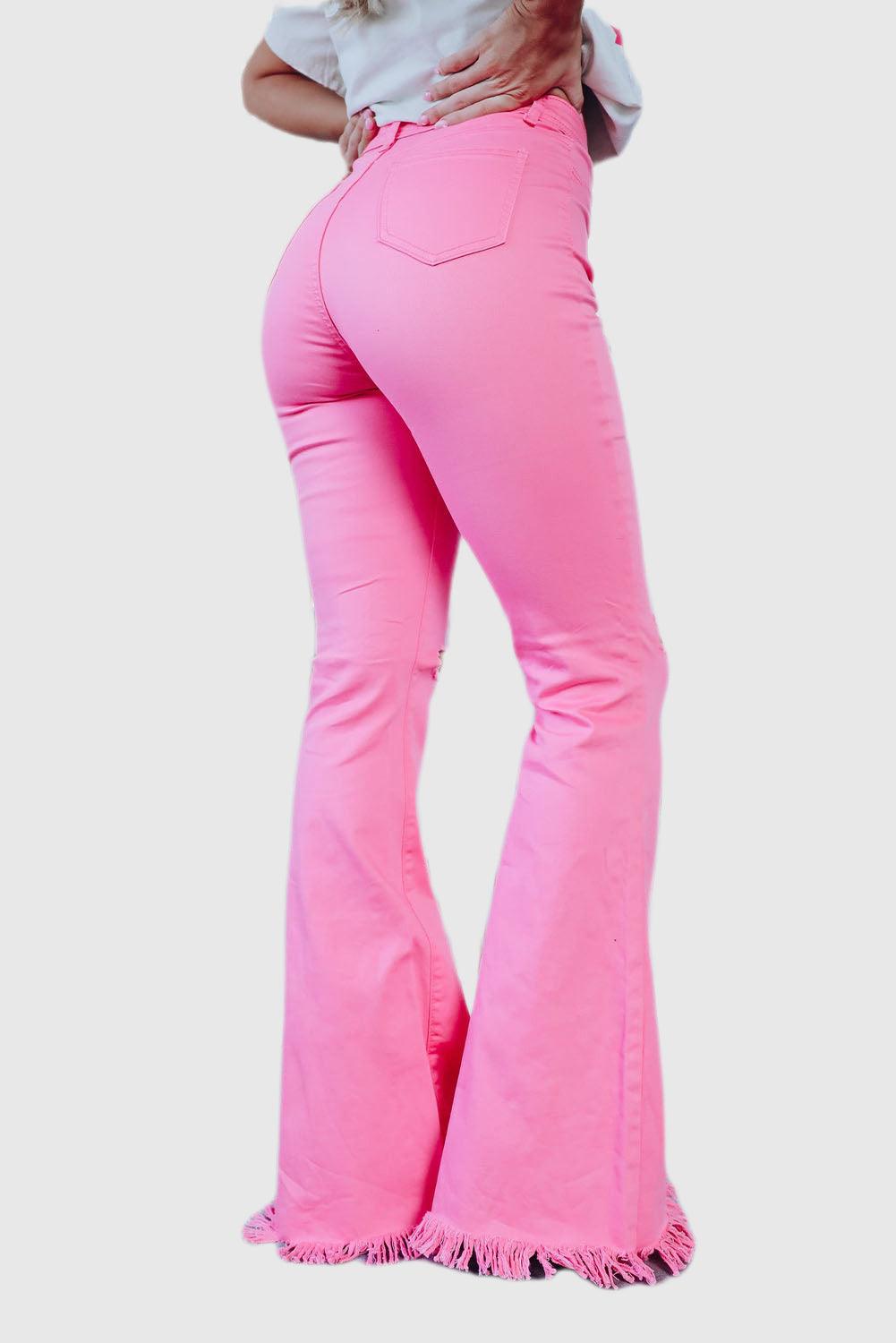 Pink Vintage-Inspired High-Waisted Flared Jeans with Ripped Raw Hem