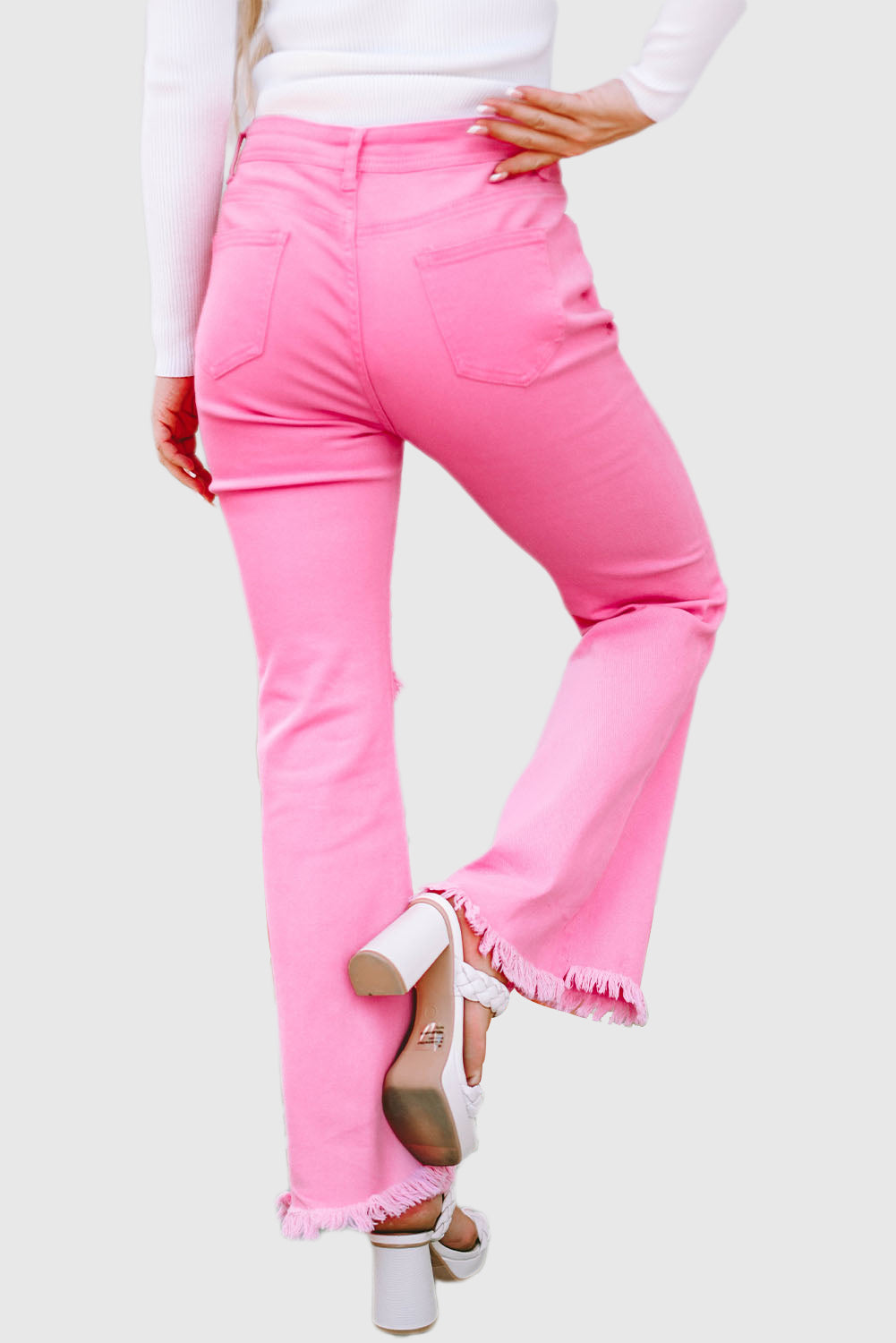 Pink Vintage-Inspired High-Waisted Flared Jeans with Ripped Raw Hem