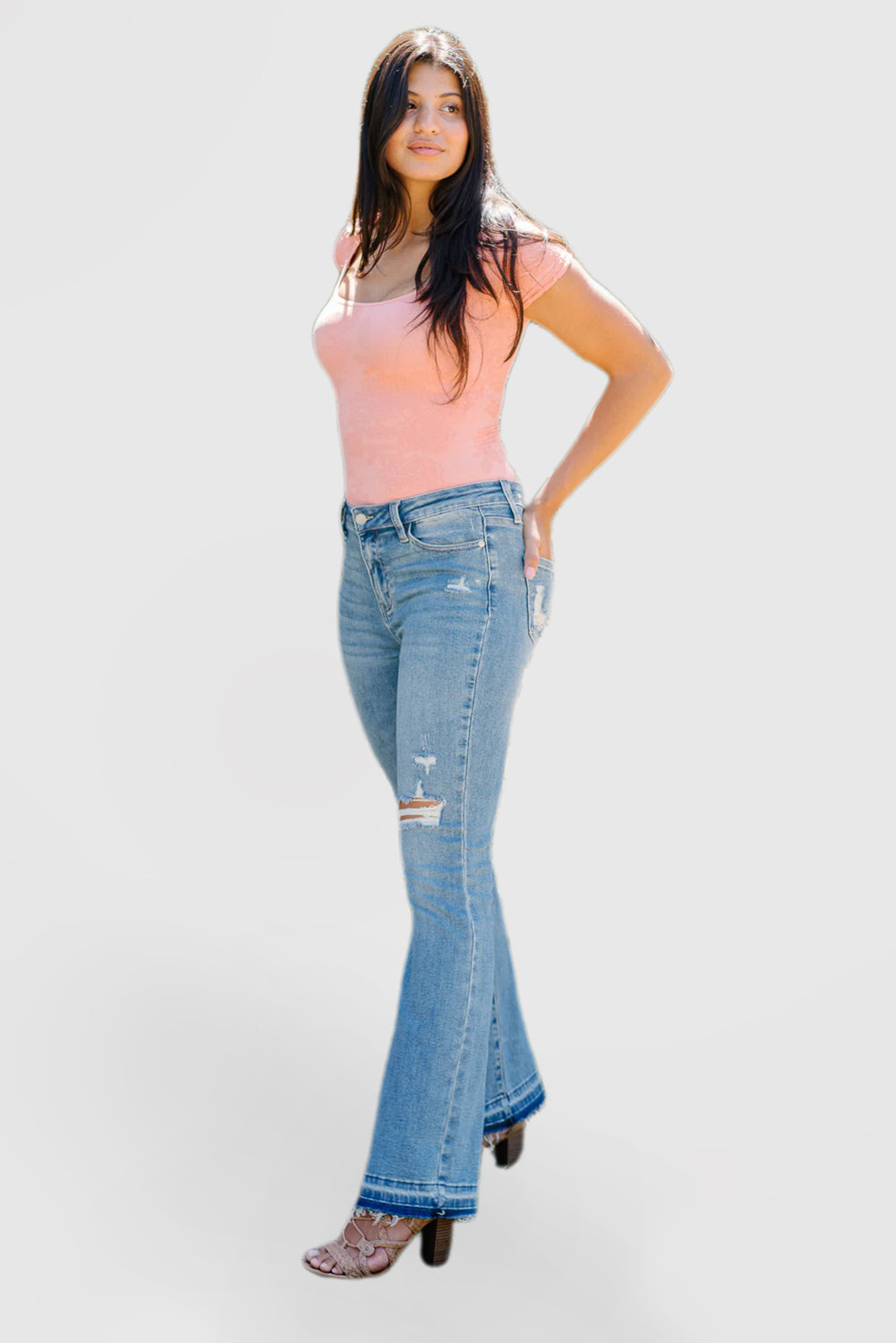 Mid-Rise Bootcut Jeans with Embossed Hem Rips
