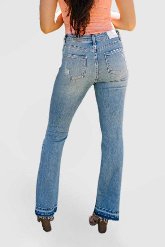 Mid-Rise Bootcut Jeans with Embossed Hem Rips