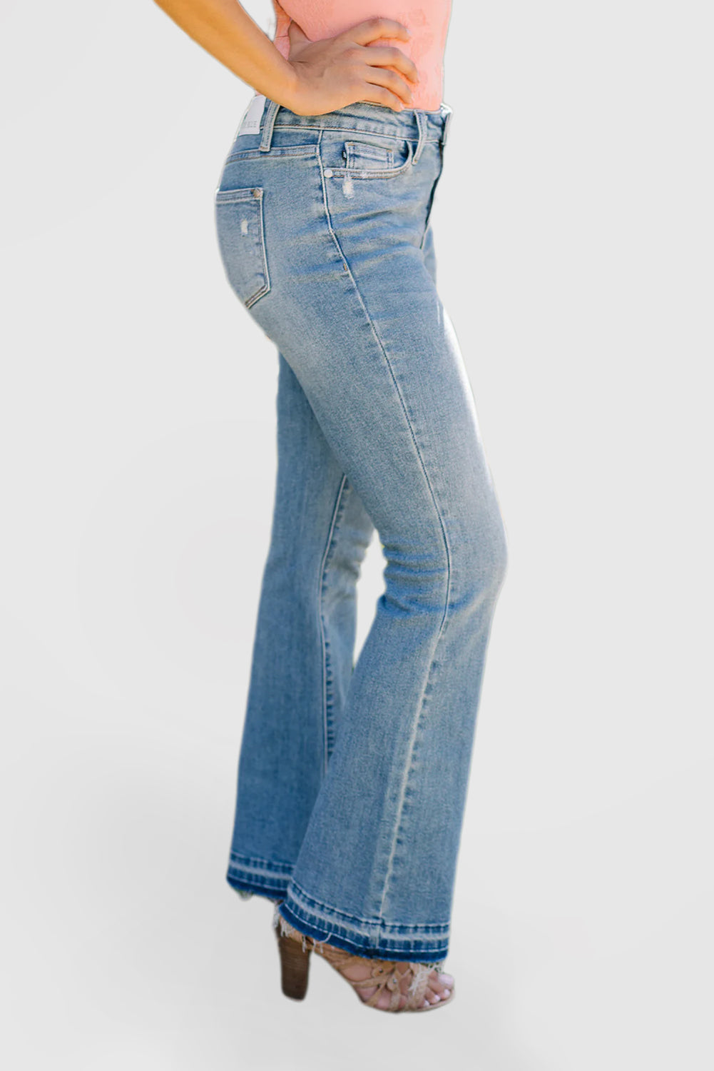 Mid-Rise Bootcut Jeans with Embossed Hem Rips