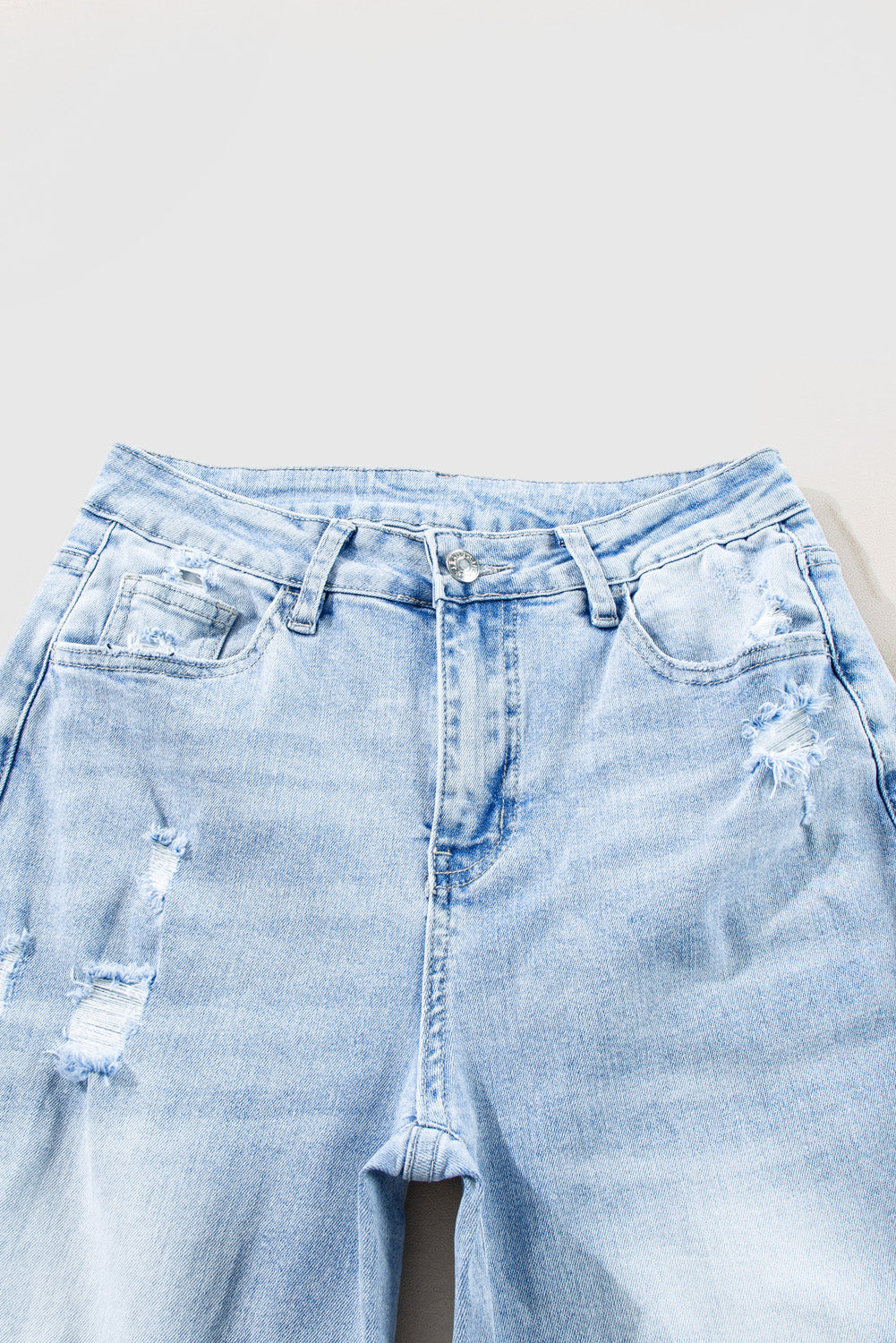 Beau Blue Light-Wash Flare Jeans with Distressed Detailing